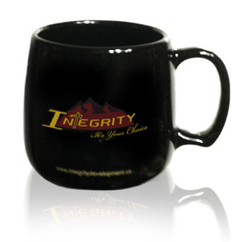 A black mug with an Integrity Development logo